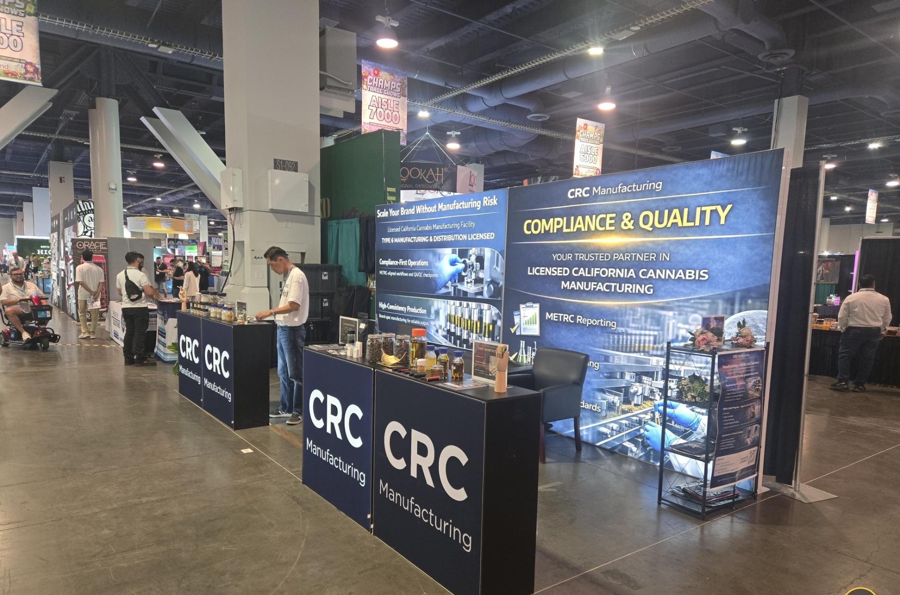 CHAMPS Las Vegas trade show aisle beside the CRC booth
